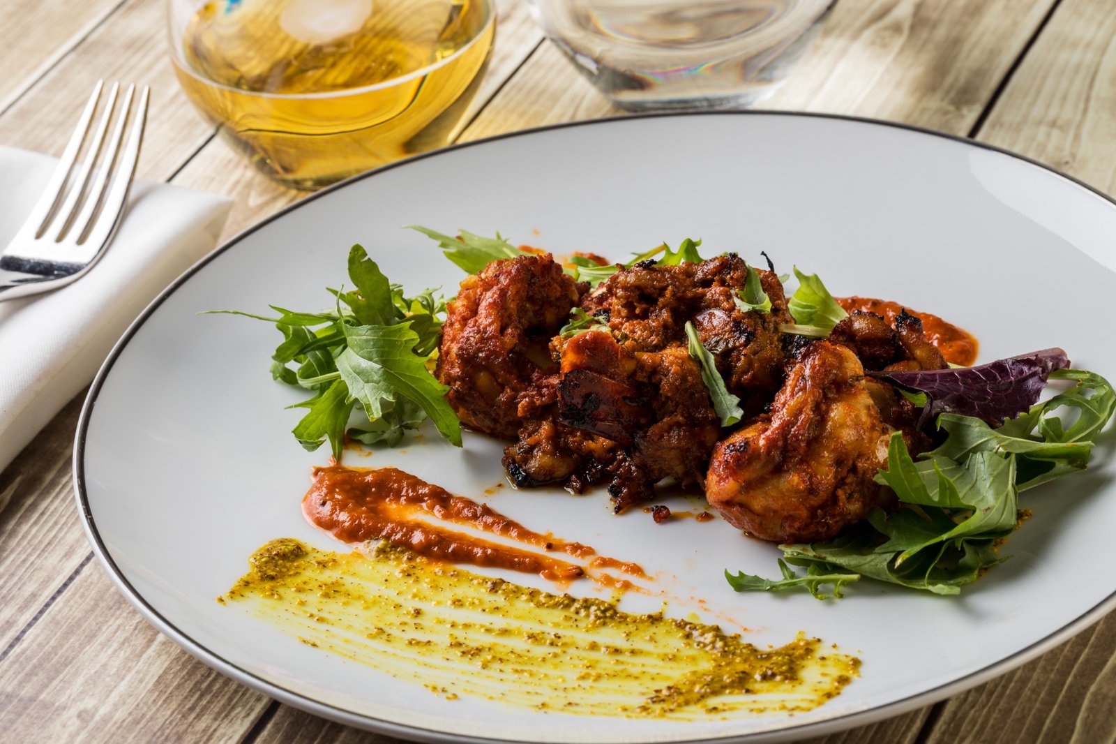 Indian dish plated at La Indika